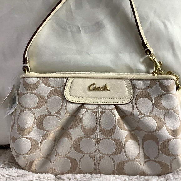 Coach Handbags - Coach, Ivory Signature Canvas Large Wristlet w Tag
